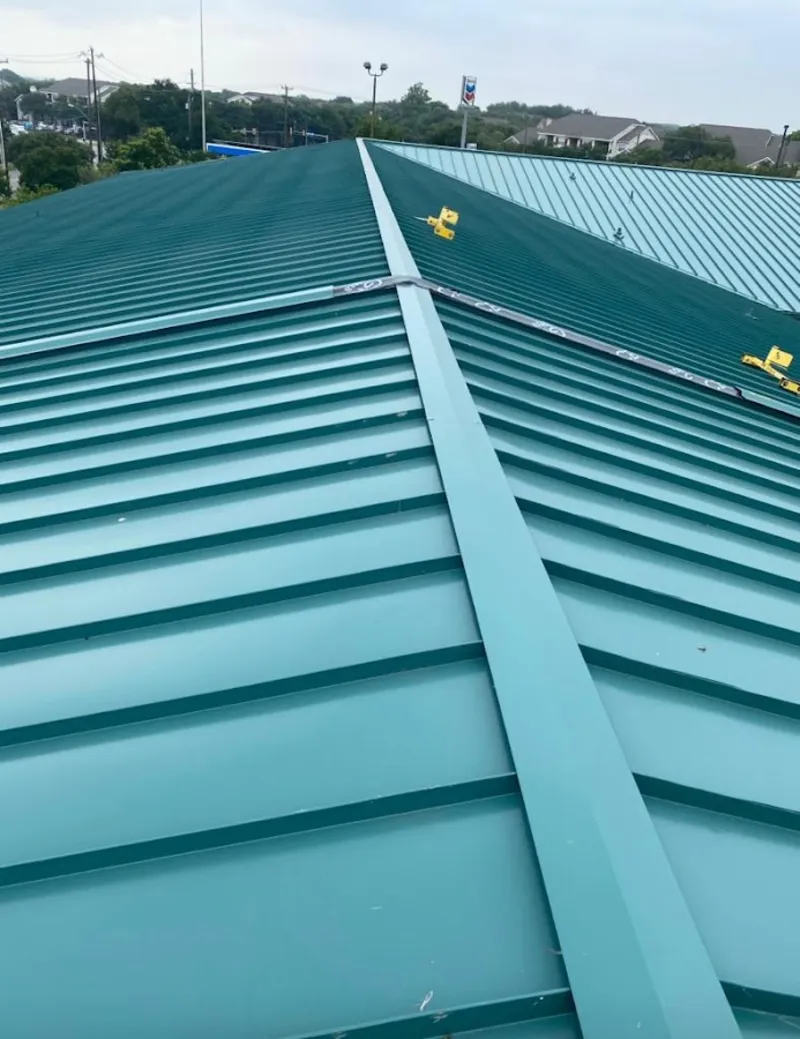 Green commercial metal roof ridge and valley for Metal Roof Repair in Lower Macungie